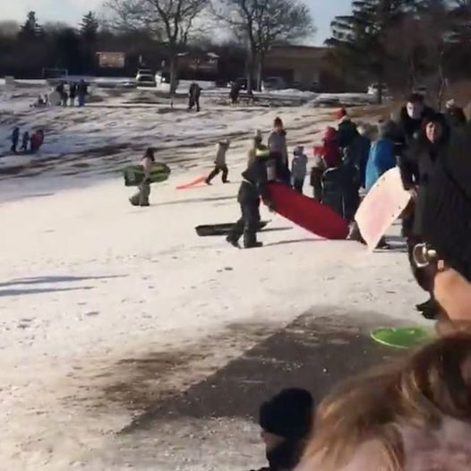 Police remove parents and children from tobogganing hill in Oakville